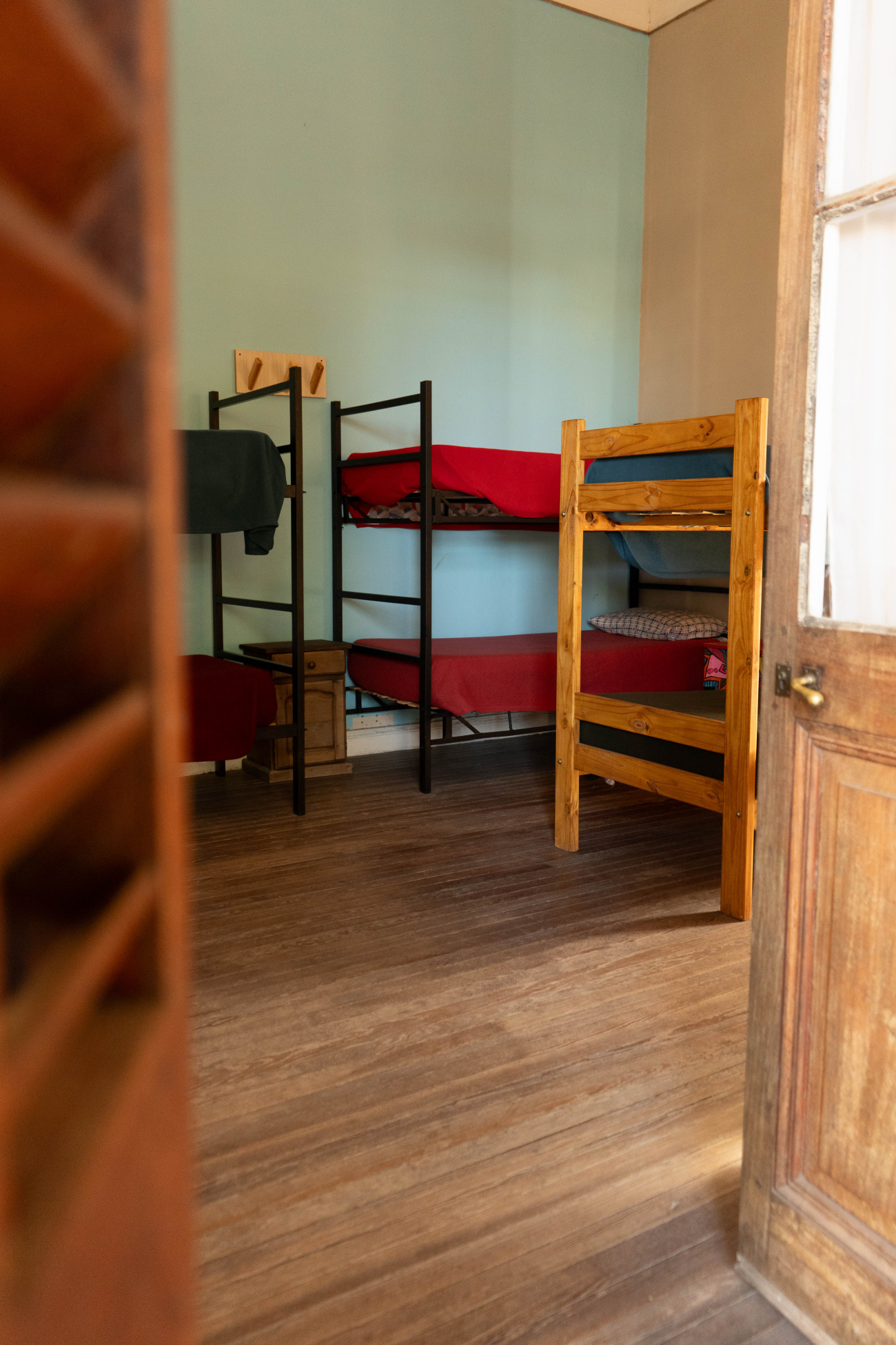 Cama en habitación compartida mixta